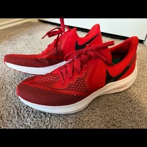 Red men’s Nike Zoom running shoes